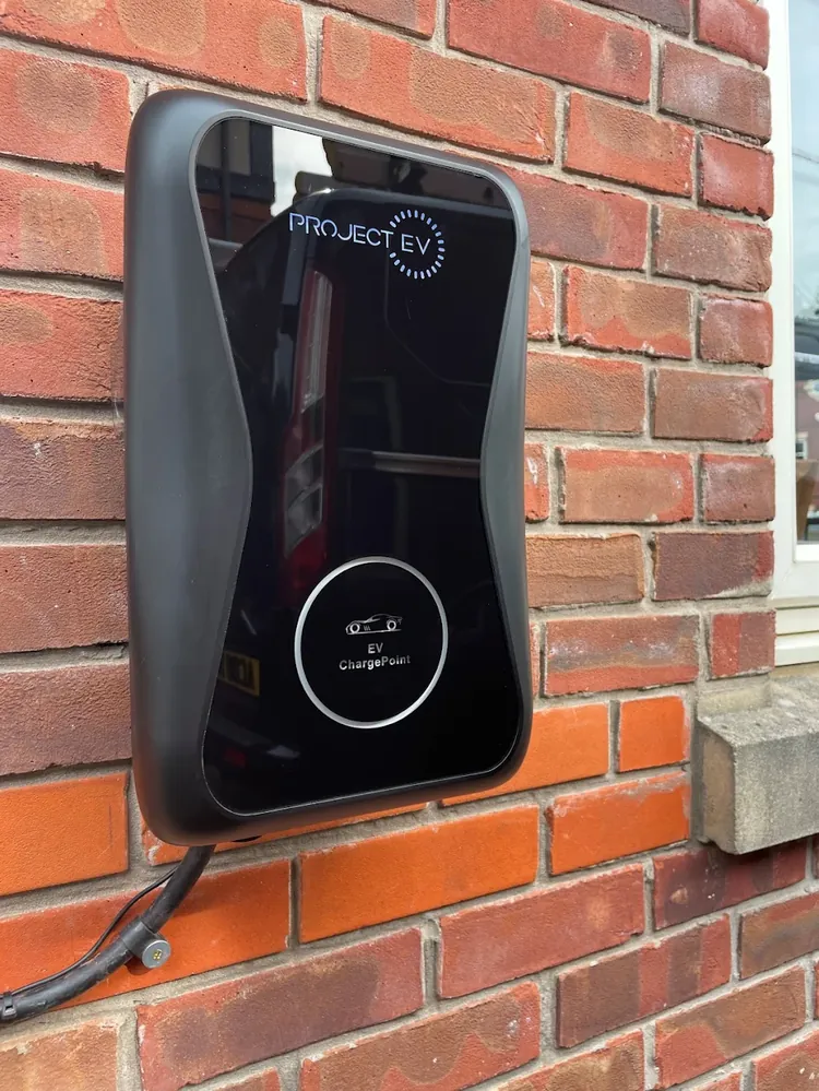 An EV charge point installed on a home