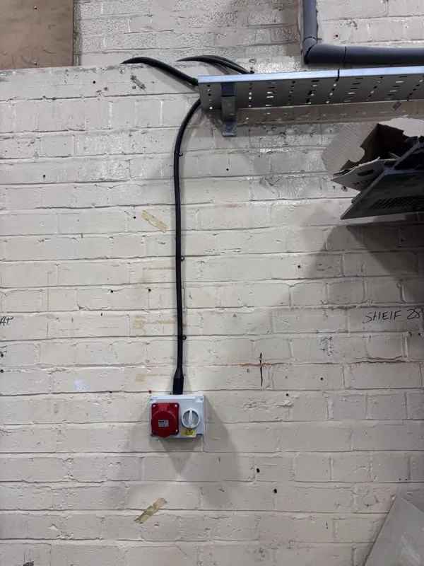A three-phase supply and isolator for commercial equipment