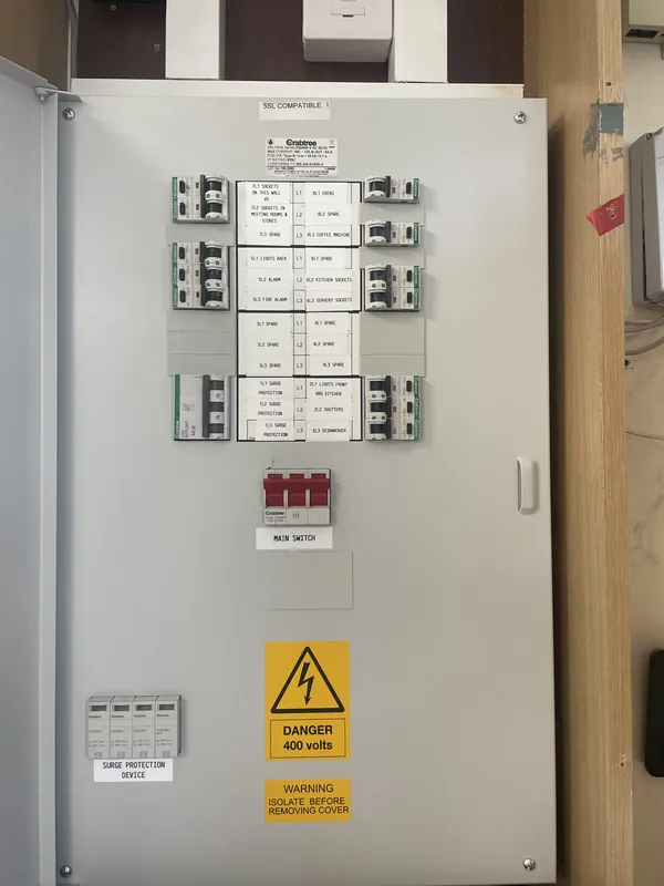 A three-phase distribution board serving a commercial kitchen