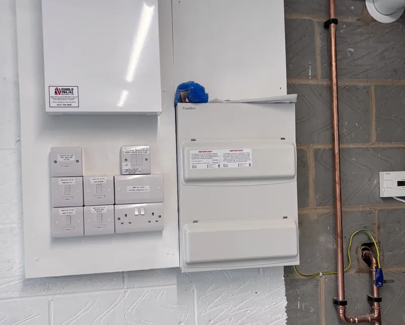 A new consumer unit fitted alongside the heating and alarm controls