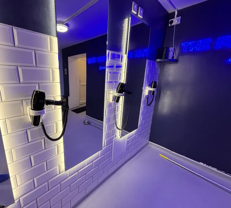 A commercial washroom fit-out with lighting, power and hair-dryer points