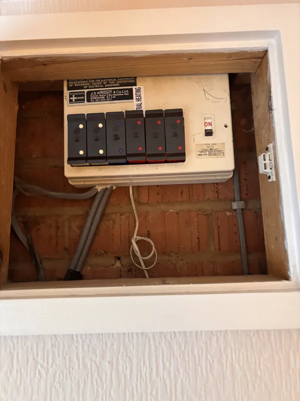 The old rewireable fuse box replaced during a consumer unit upgrade