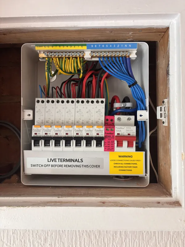 A fully wired consumer unit upgrade, neatly terminated and labelled