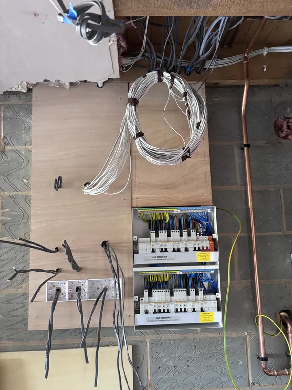 First-fix of a new installation with distribution boards, circuits and back boxes