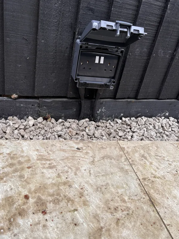 A weatherproof twin outdoor socket